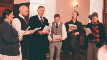 Caroling singers in the church at Ulster Folk Museum