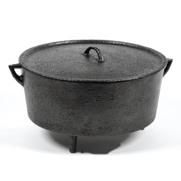 A metal cooking pot with a lid on top.