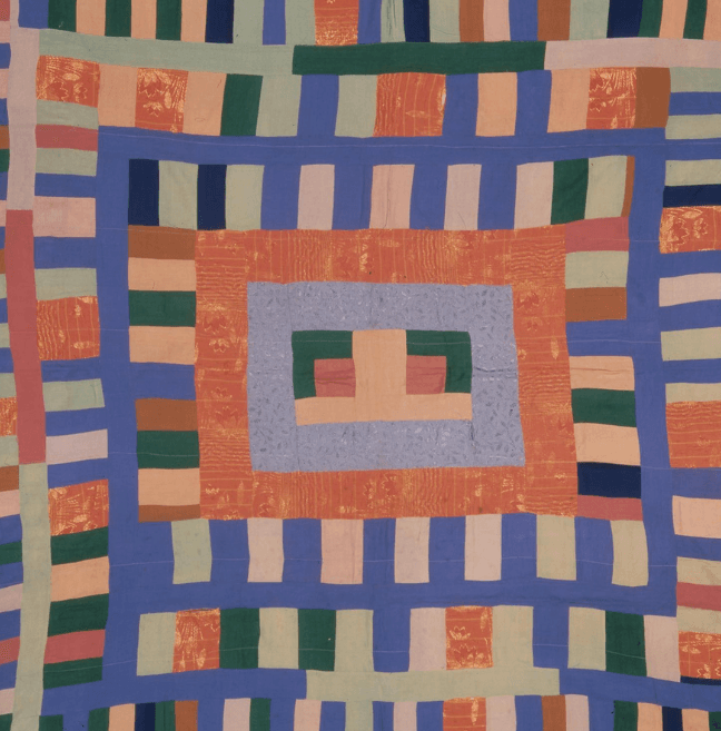 Recycled material patchwork quilt, using orange, peach, blue and mint green rectangles. 