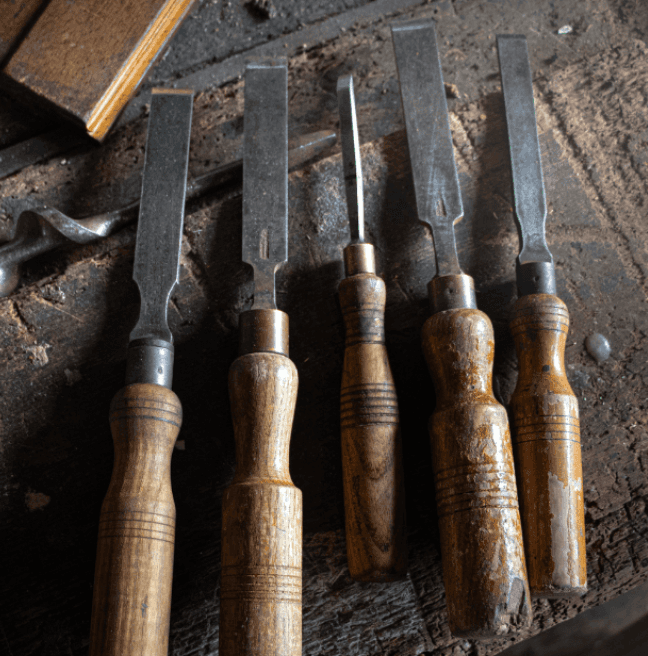 Carpentry tools on a wooden workbench