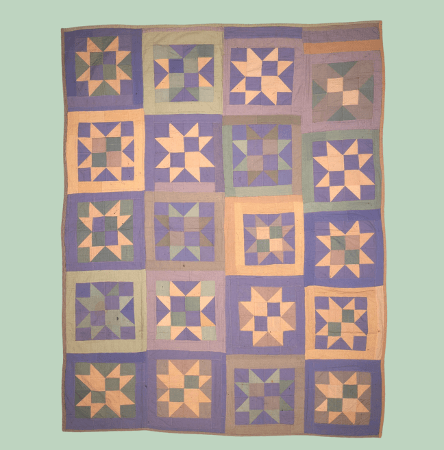soft pastel coloured patchwork quilt