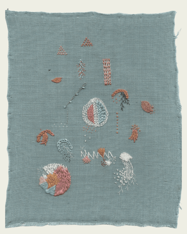 A green linen canvas is embroidered with naturally dyed thread, referencing sea creatures.