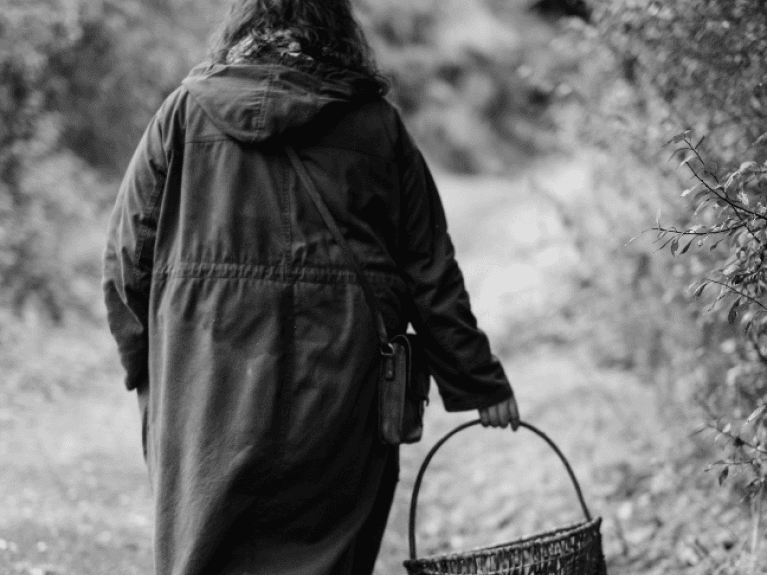 Clare McQuillan with a basket, foraging